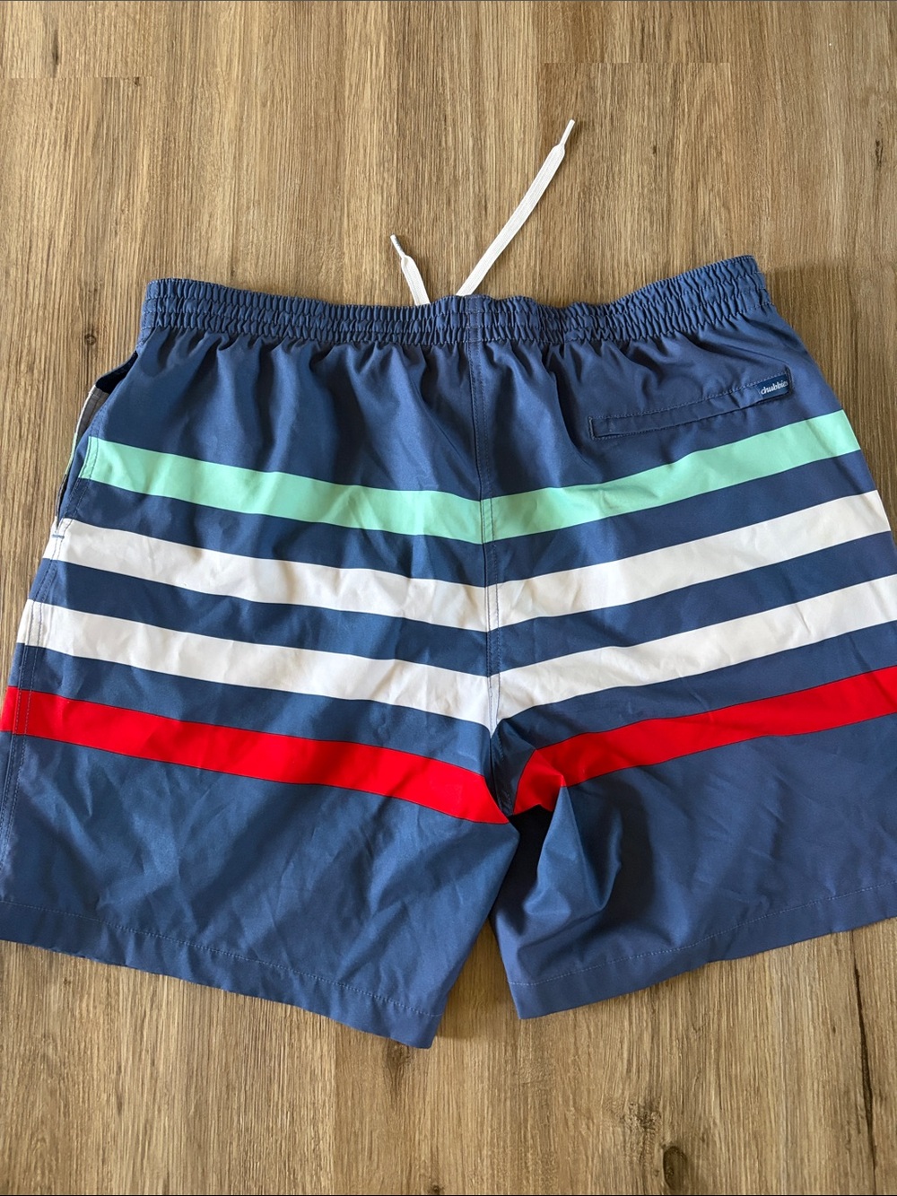 chubbies Navy Swim Trunks with Red, White & Mint Stripes